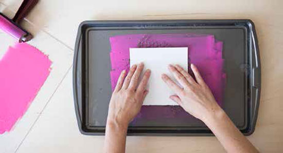 Press paper gently over object.